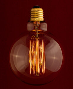 Edison Globe large bulb with E27 screw on red background