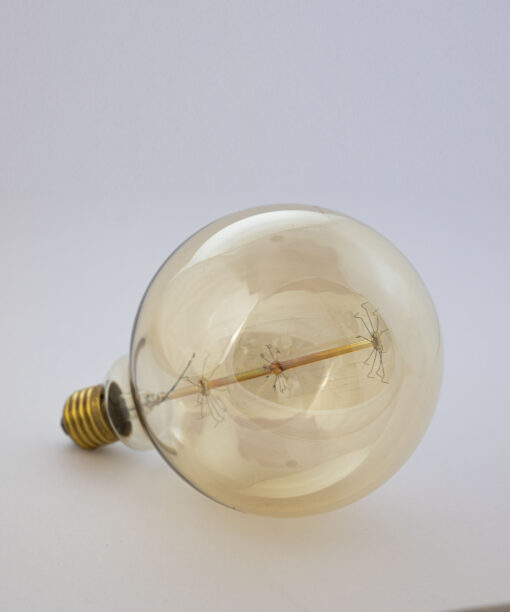 edison G125 bulb on a white kitchen table