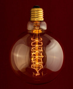 Edison E27 G125 Globe Spiral incandescent light bulb on red Background