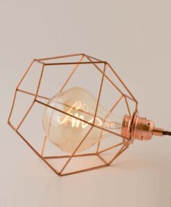 Rose gold Hexagon cage with Melt LED bulb On the table side view