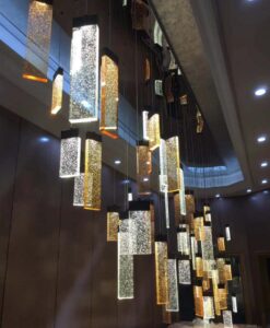Cluster of 45 K9 Crystal LED light hanging from Hotel lobby