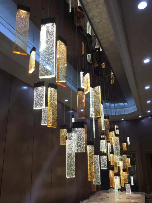 Cluster of 45 K9 Crystal LED light hanging from Hotel lobby