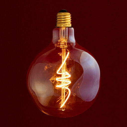 Edison Melt Sculpture Globe G125 LED bulb on Red Background