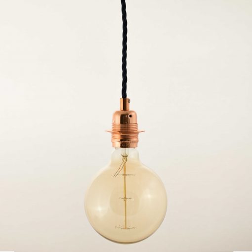 Pendant celing light in Rose gold with G125 Globe edison bulb hanging from Ceiling
