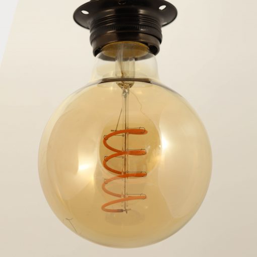 Close up of G95 Spiral Edison LED bulb hanging from Ceiling