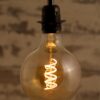 Globe edison filament g125 light bulb with hanging from Ceiling